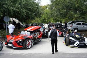 Slingshot vehicles wait to join funeral procession/ Photo Courtesy of Tampa Bay Times